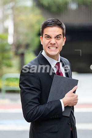 街でビジネスマンの男性の激怒！の表情 a0010386PH