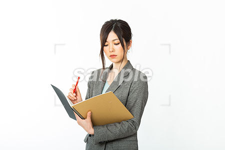 OLの女性の筆記用具を見る a0021122PH