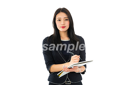 切り抜き写真素材。ノートに何かを書いている女性、目線有り（PSD形式/切抜マスク付き） cta0040225PH